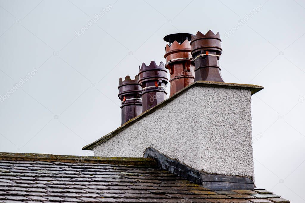 Old chimney pot on chimney in York UK