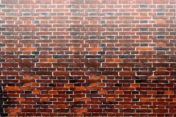 Imagen de una pared de ladrillo utilizada como fondo —  Fotos de Stock