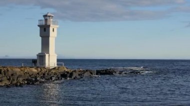 Akranes 'teki Deniz Feneri Sunset, İzlanda.