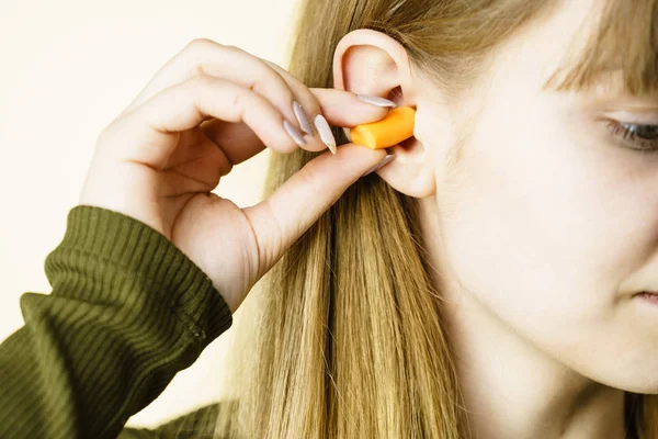 Woman Putting Ear Plugs Her Ears Getting Rid Noise Loud — Stock Photo, Image