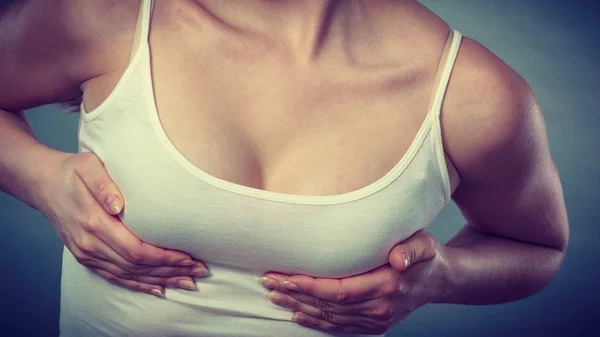 Health Care Bosom Concept Young Woman Wearing Tshirt Holding Hands — Stock Photo, Image