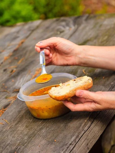 Female Tourist Backpacker Eating Meal Warm Soup Bread Slice Picnic — Stock Photo, Image