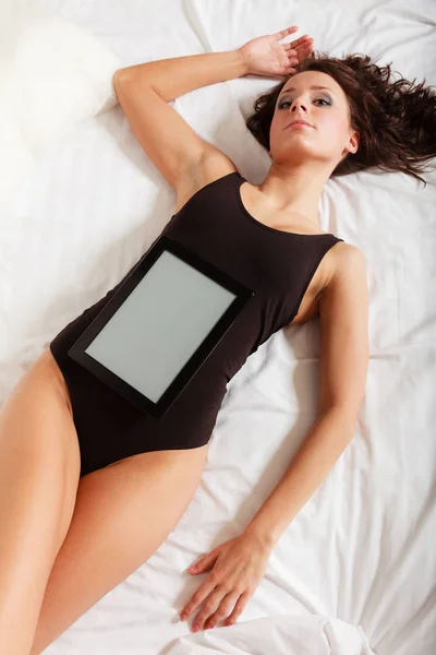 Sexy Lazy Girl Body Underwear Lying Tablet Touchpad Blank Copy — Stock Photo, Image