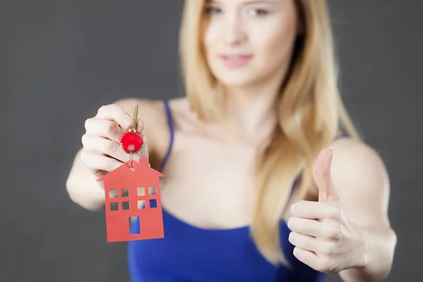 Young Woman Holding New House Key Red Home Shape Giving — Stock Photo, Image