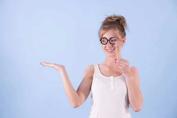 Elegant Young Woman Pretending Wearing Funny Nerd Eyeglasses Showing Copy — Stock Photo, Image