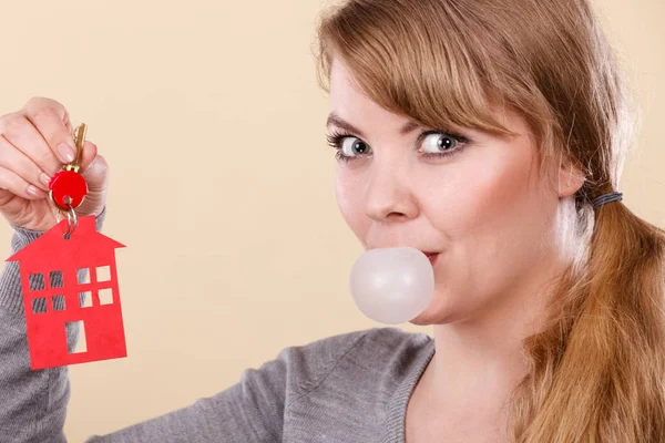Young Happy Woman Doing Bubble Chewing Gum While Holding New — Stock Photo, Image