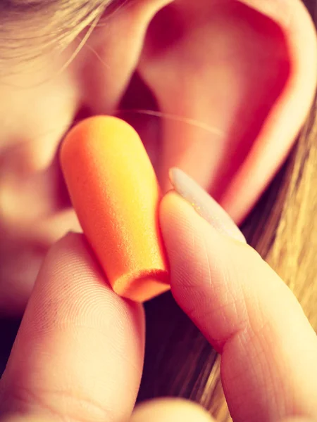 Woman Putting Ear Plugs Her Ears Getting Rid Noise Loud — Stock Photo, Image