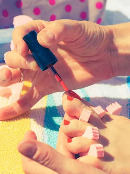 Woman Relaxing Doing Her Pedicure Red Nail Polish Beach Towel — Stock Photo, Image