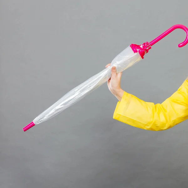 Rainy Day Accessories Concept Woman Hand Wearing Yellow Raincoat Holding — Stock Photo, Image