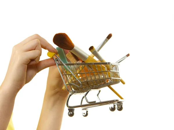 Woman Holding Shopping Cart Full Beauty Accessories Various Make Brushes — Stock Photo, Image