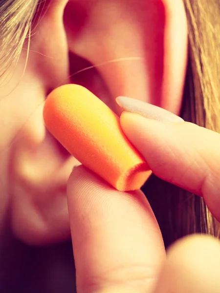 Woman Putting Ear Plugs Her Ears Getting Rid Noise Loud — Stock Photo, Image