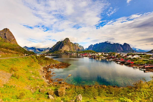 Beautiful scenery fjord landscape with Reine village, coast nature with sharp high mountain peaks, Lofoten islands North Norway. Travel destination.