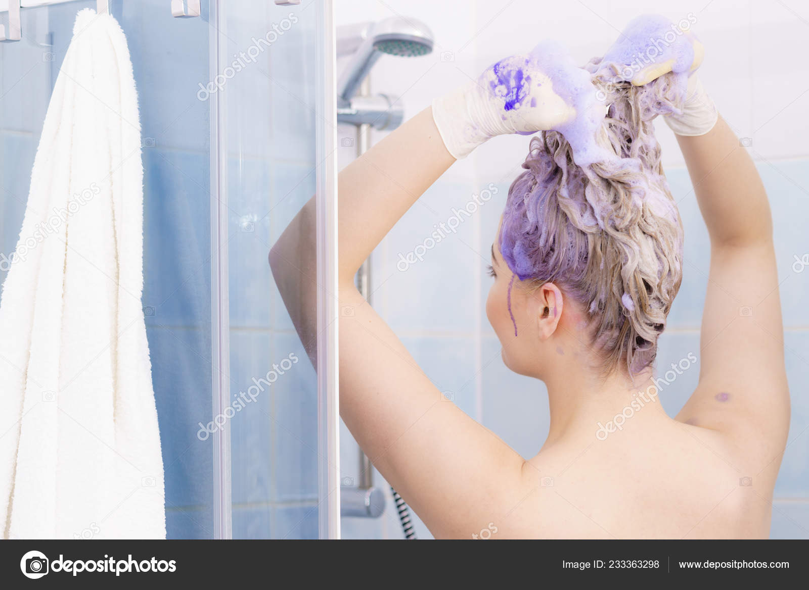 Woman Wearing Latex Protective Gloves While Applying Purple Toner