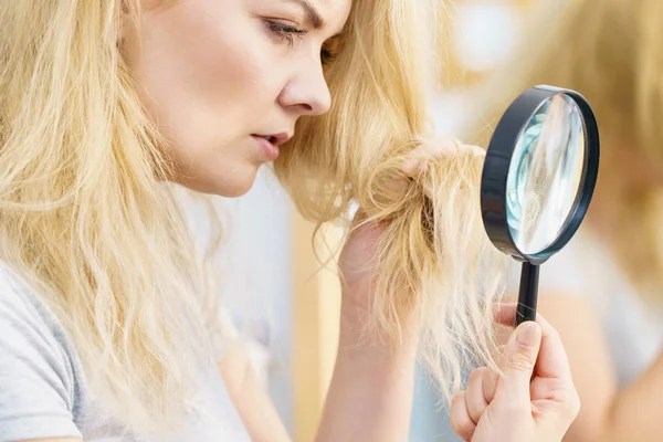 Blonde Woman Looking Her Dry Split Ended Hair Using Magnifying — Stock Photo, Image