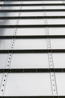 Metal desenli arkaplandan yapılmış detaylı levha. Endüstriyel doku kavramını kapat.