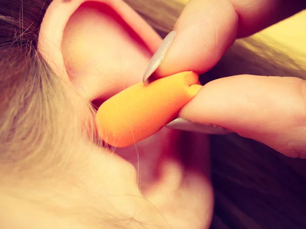 Woman Putting Ear Plugs Her Ears Getting Rid Noise Loud — Stock Photo, Image