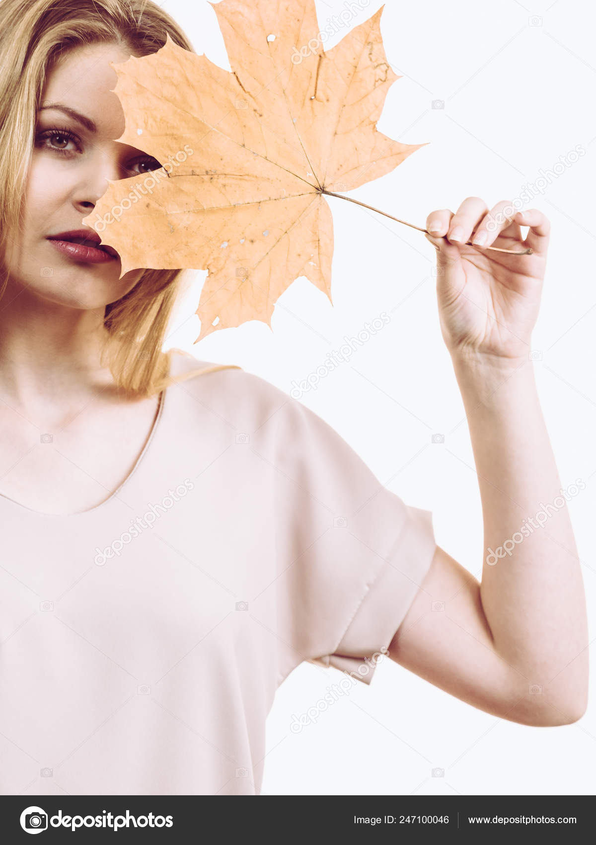 Fashionable Autumn Long Hair Blonde Girl Holding Autumnal Dry