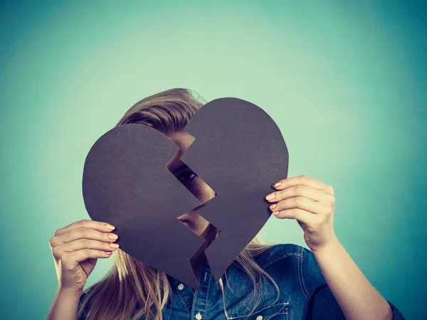 Young woman with broken heart — Stock Photo, Image
