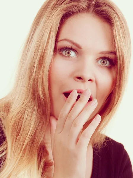 Lovely young woman being shocked Stock Photo
