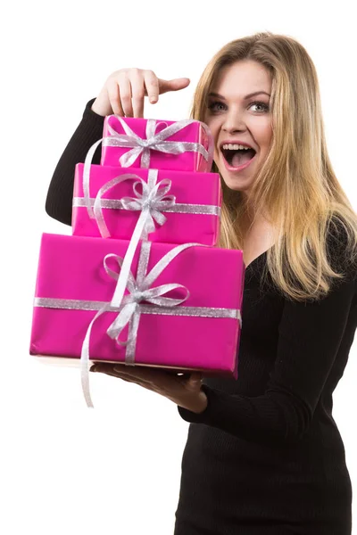 Surprised girl with pink gift boxes — Stock Photo, Image