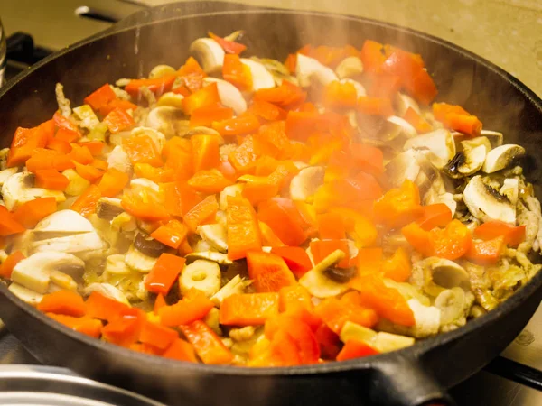 Mixed vegetables in pan.