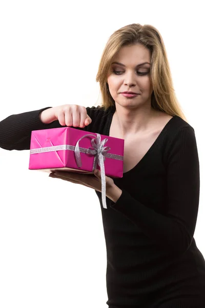 Girl opening pink gift box — Stock Photo, Image