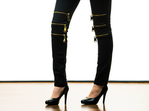 Black jeans with high heels