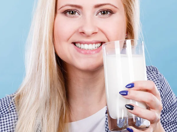 Woman drinking milk from glass Stock Image