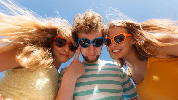 Group friends boy two girls having fun outdoor — Stock Photo, Image