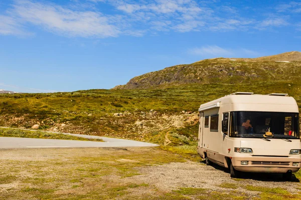 Camper car in norwegian mountains Royalty Free Stock Photos