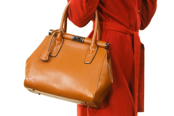 Donna che indossa abito rosso holding bag — Foto Stock