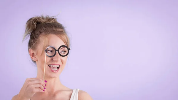 Elegant woman pretending wearing eyeglasses — Stock Photo, Image