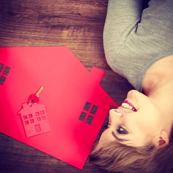 Young lady on floor with home. — Stock Photo, Image