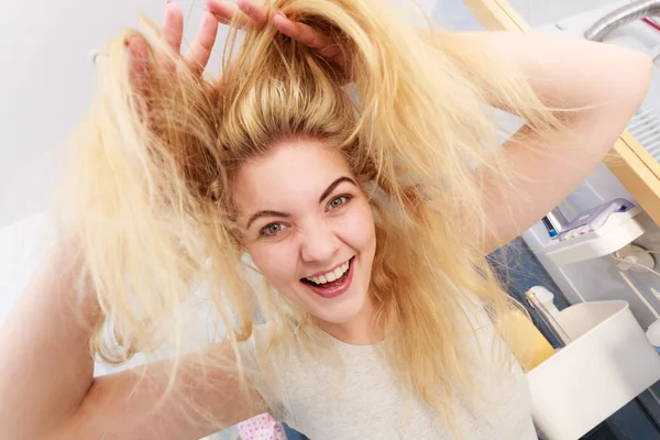 Woman with long blonde hair