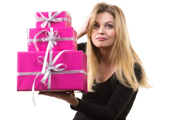 Happy surprised woman with many gifts — Stock Photo, Image