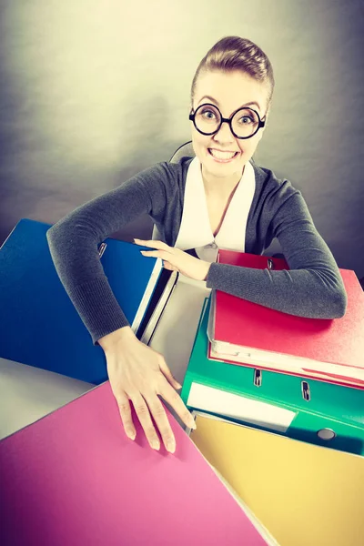 Happy crazy accountant with piles of binders. — Stock Photo, Image