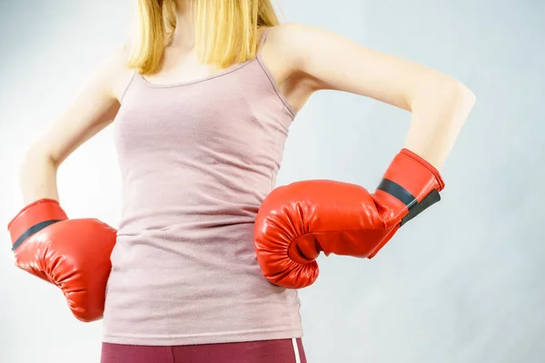 Woman wearing boxing gloves — Stock Photo, Image