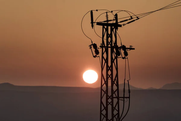 Kust Med Elöverföringspyloner Kraftledningar Högspänningstorn Solnedgång Landskap Spanien — Stockfoto