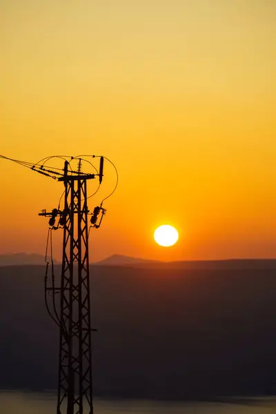 Coast Electricity Transmission Pylons Power Lines High Voltage Towers Sunset — Stock Photo, Image