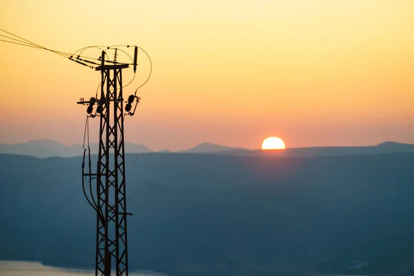 Coast Electricity Transmission Pylons Power Lines High Voltage Towers Sunset — Stock Photo, Image