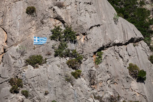 White Blue National Flag Greece Hanging Stone Wall Mountain Hills — Stock Photo, Image