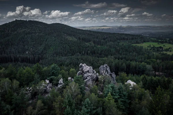 The Lusatian Mountains Protected Landscape Area is a protected area of 267 km2 established in 1976 to protect the diverse landscape of sandstone rock towns, the remnants of natural forests.