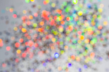 Renkli güzel bokeh arka plan tatil doku bulanık. Çok renkli ışık noktalar glitter