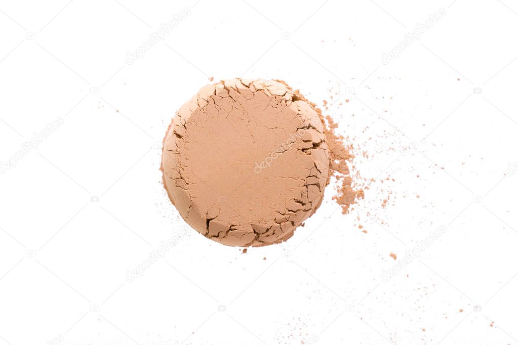 Pile of yellow cosmetic clay isolated on white background