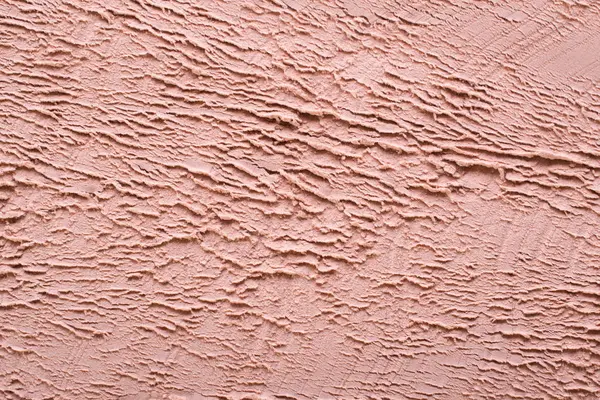 Cosmetic clay texture, background. Natural pink mask, dry clay for the face and body.