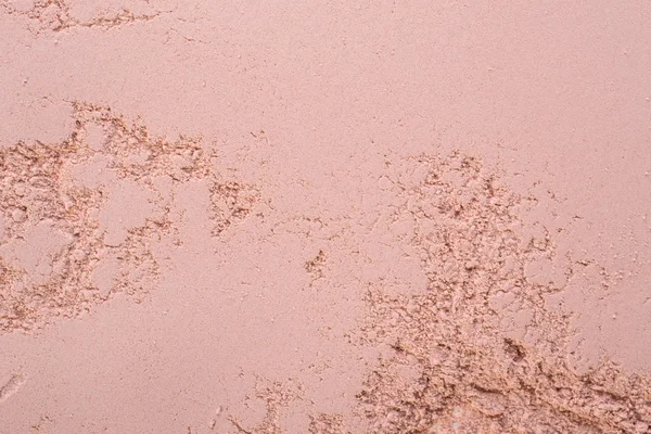 Cosmetic clay texture, background. Natural pink mask, dry clay for the face and body. Isolated on a white background