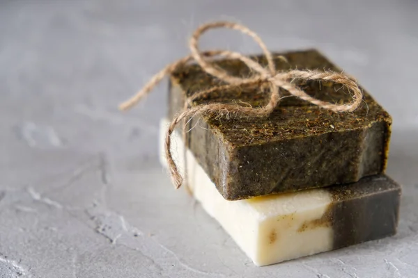 Bars of natural soap with dried herbs Natural Herbal Products. Spa cosmetics