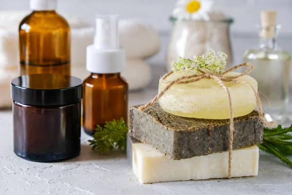 Natural cosmetic oil and natural handmade soap with loofah . Healthy skin care. SPA concept