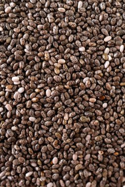 Chia tohumları yakın plan arka plan. Chia tohumlarının dokusu. Boşluğu kopyala. 