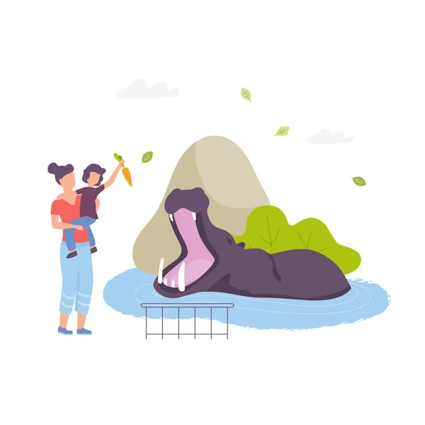 Mother and son feeding a hippo in zoo park vector flat illustration. Hippopotamus opening a mouth swiming in lake isolated on white background. — Stock Vector